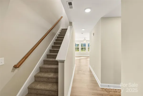 a view of entryway with wooden floor