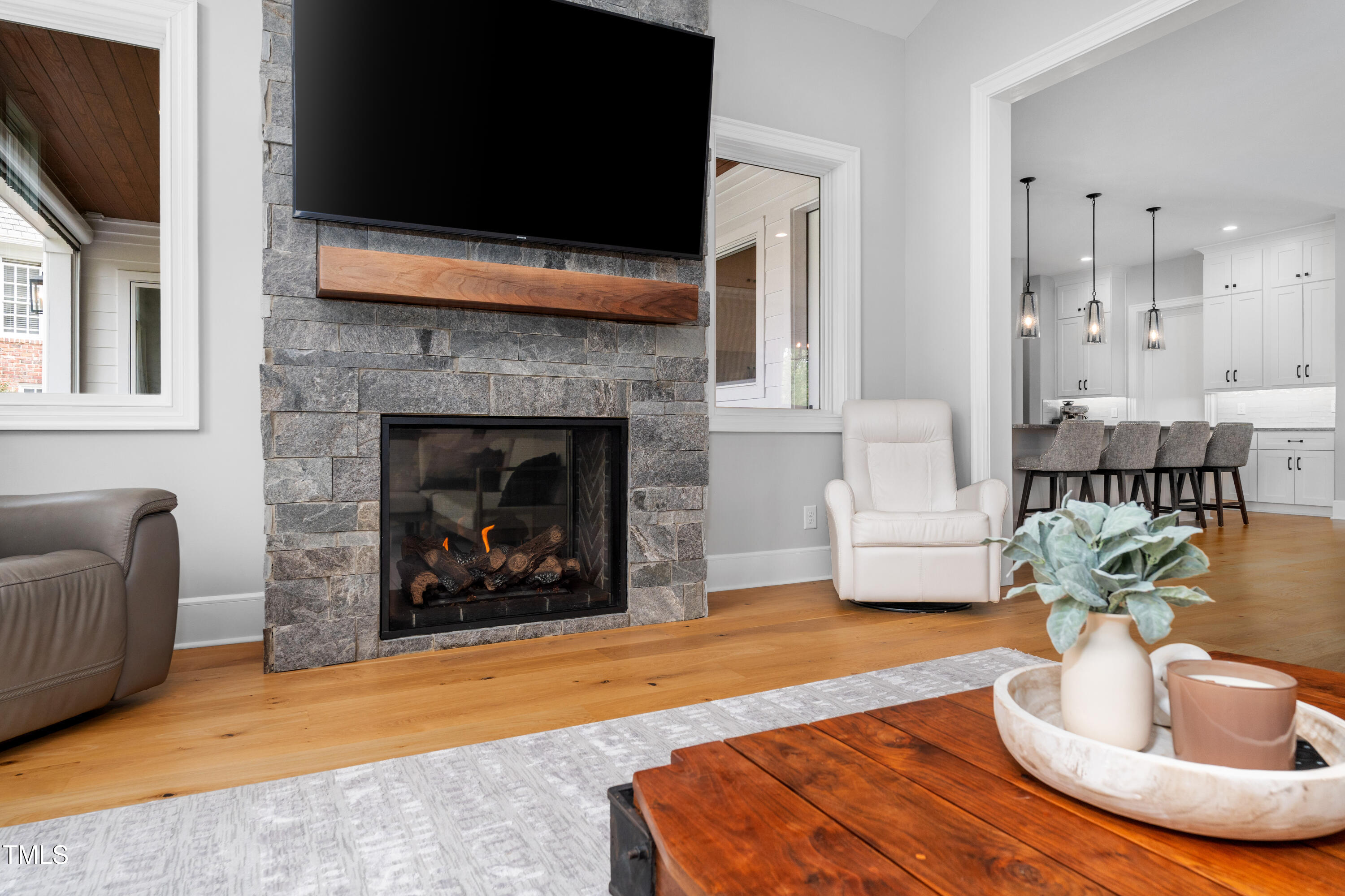 1213 Rocky Point Lane Durham, NC 27712 - Photo 21 of 76 a living room with furniture and a fireplace