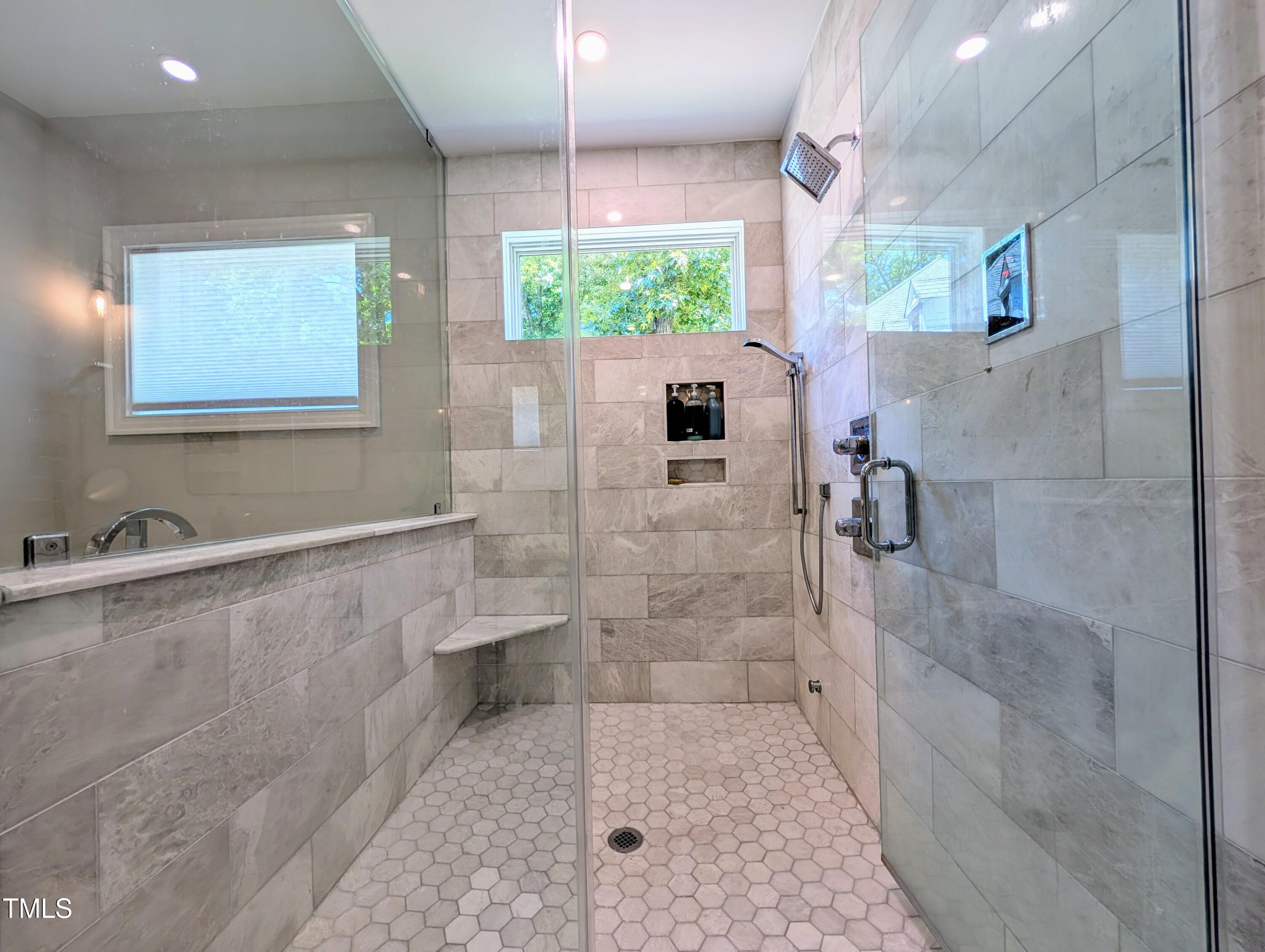 1213 Rocky Point Lane Durham, NC 27712 - Photo 26 of 76 a bathroom with a shower