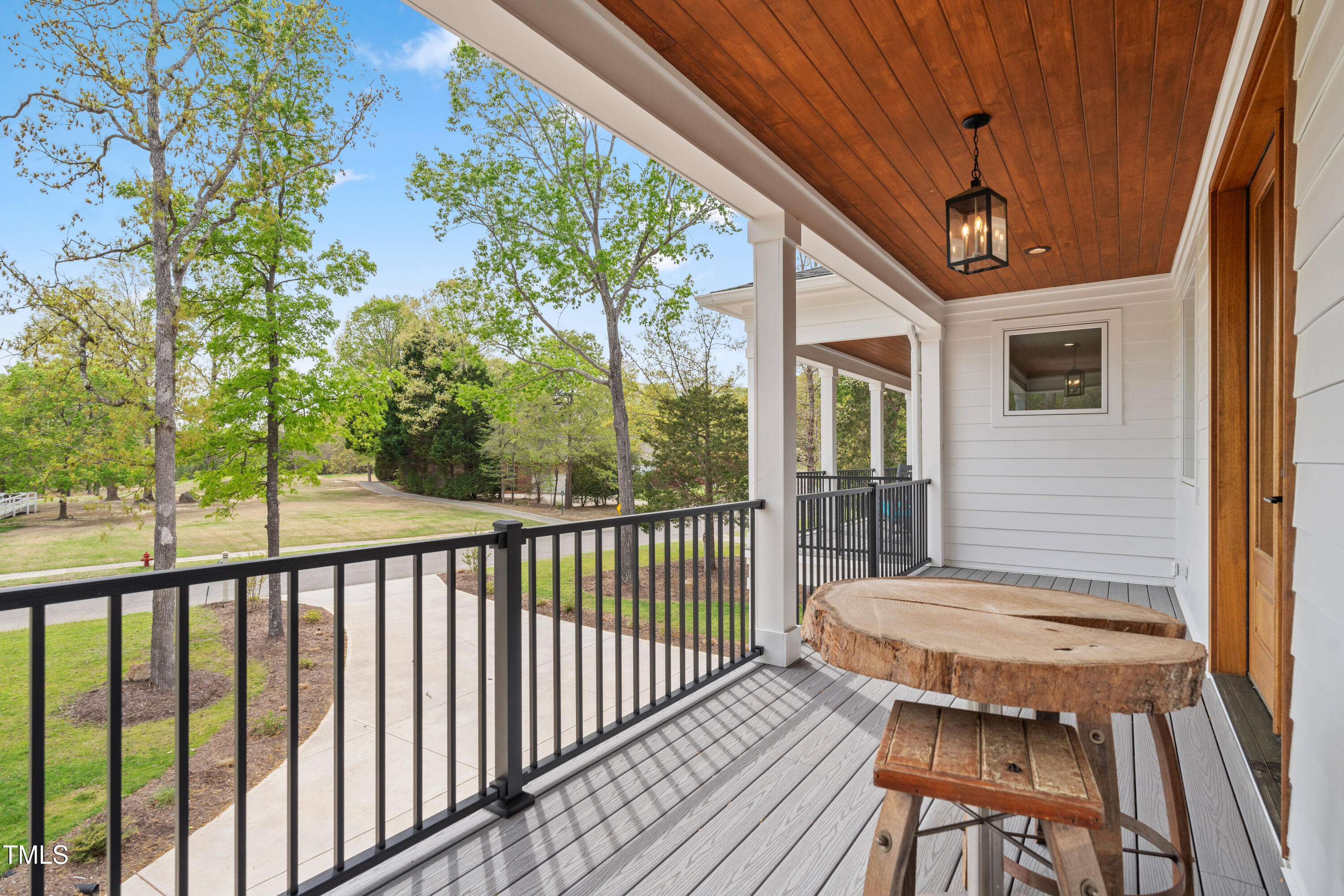 1213 Rocky Point Lane Durham, NC 27712 - Photo 42 of 76 a view of a balcony with wooden floor