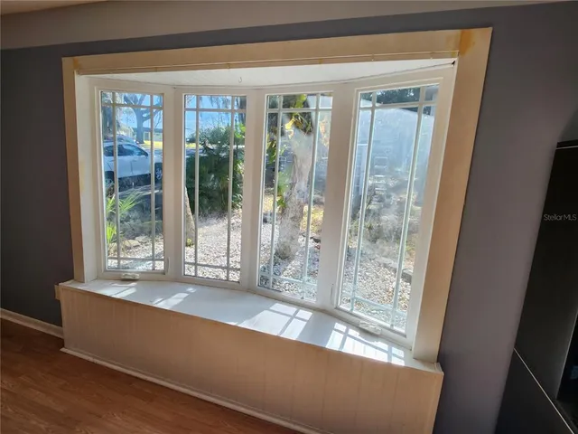 a view of a kitchen and dining room