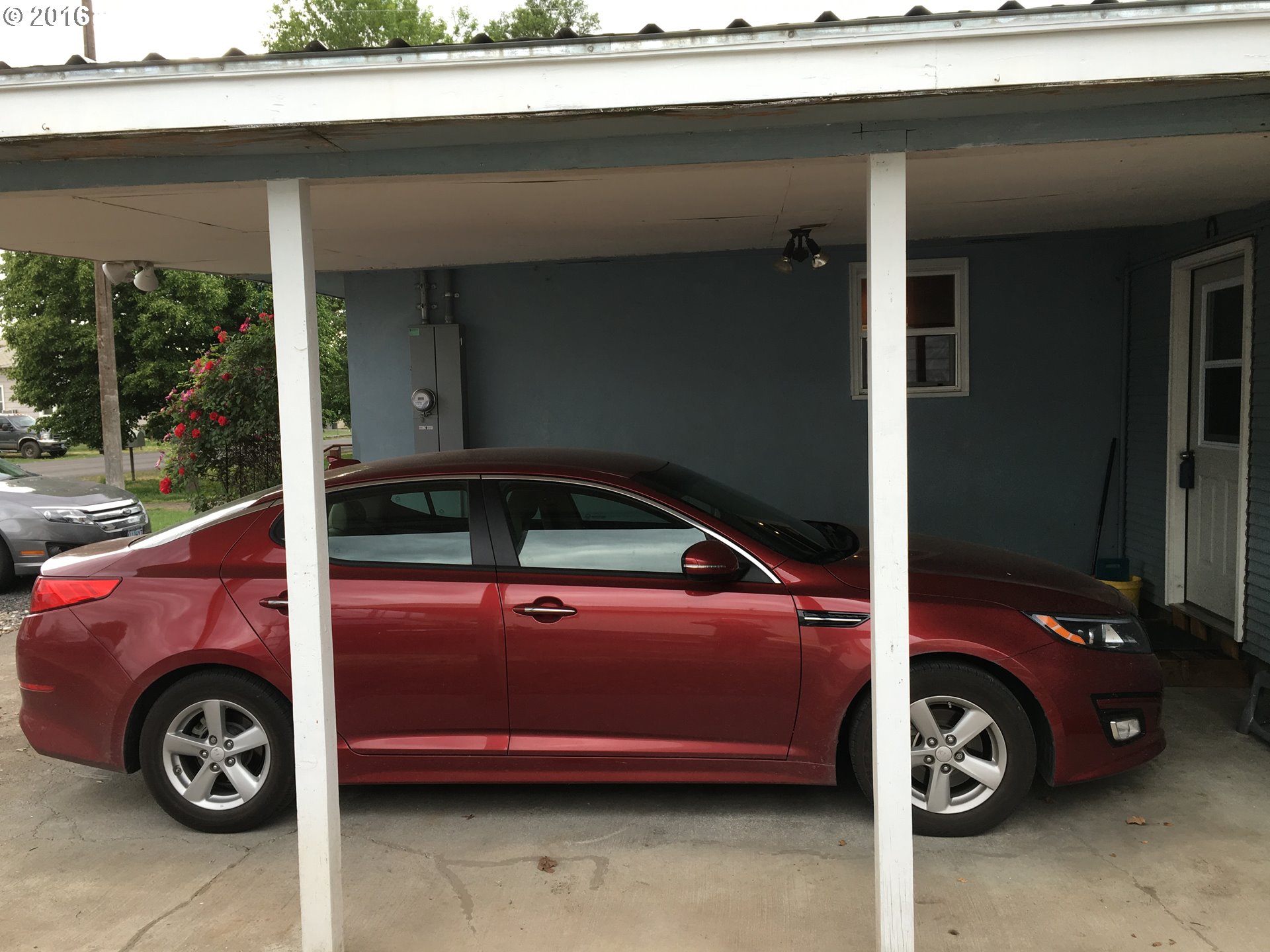 3311 Northeast Riverside Avenue Pendleton, OR 97801 - Photo 2 of 13 a front view of a house with a car parked in front of it