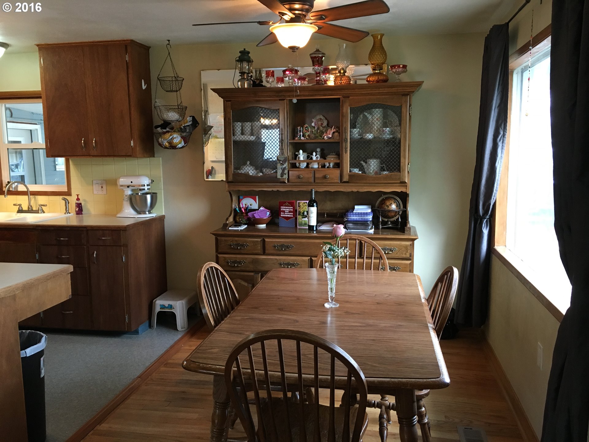 3311 Northeast Riverside Avenue Pendleton, OR 97801 - Photo 3 of 13 a view of a dining room with furniture and chandelier
