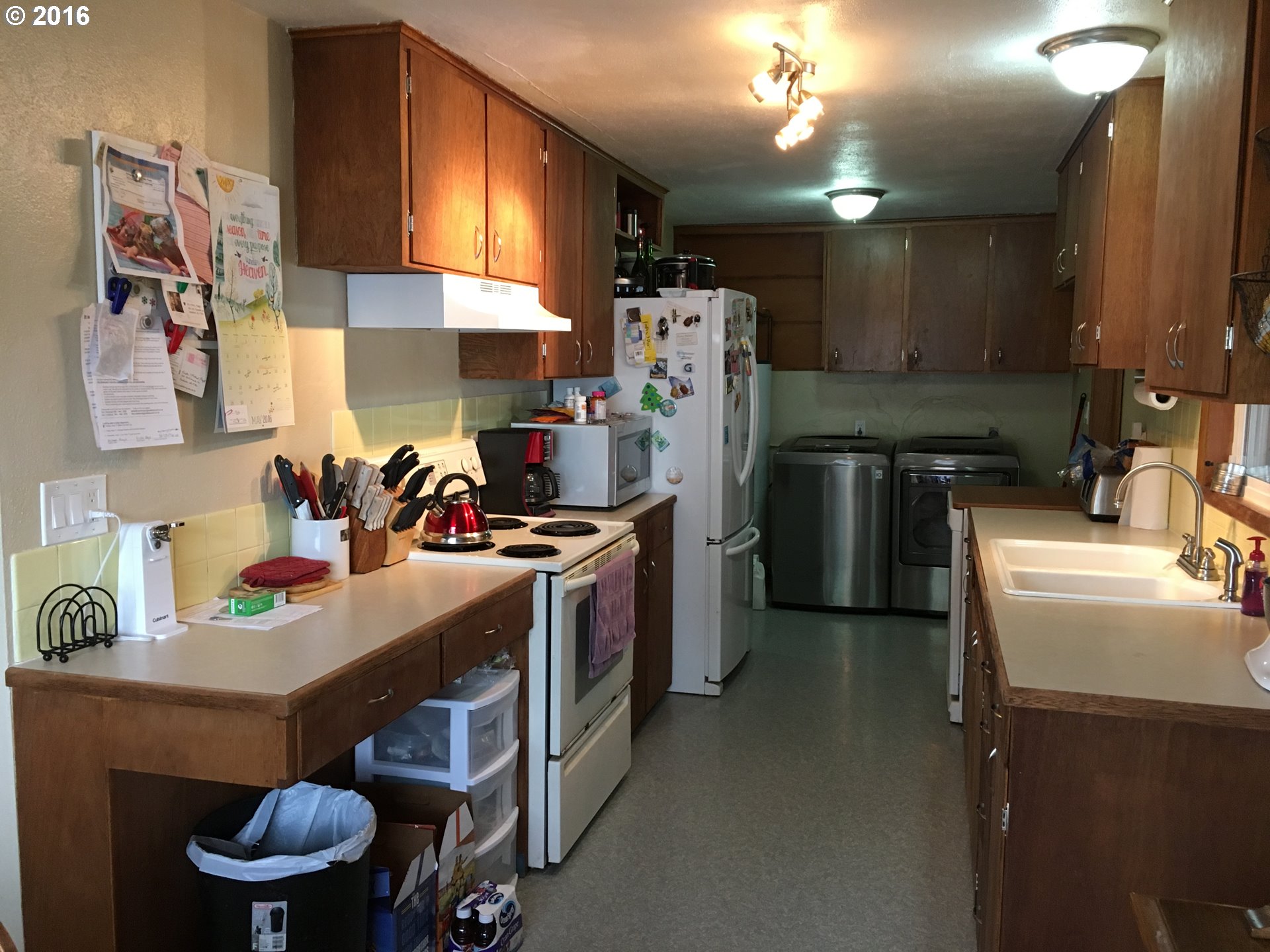 3311 Northeast Riverside Avenue Pendleton, OR 97801 - Photo 6 of 13 a kitchen with a sink appliances and cabinets