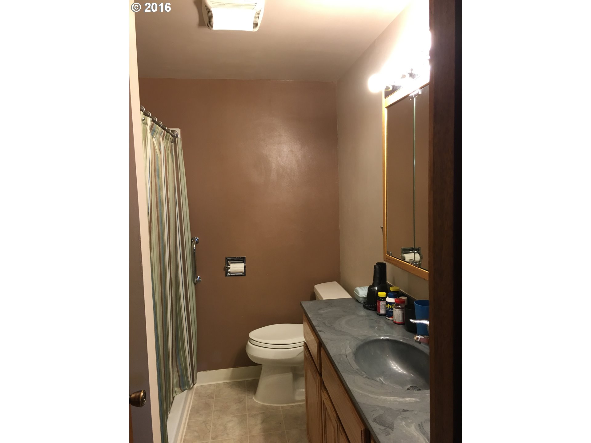 3311 Northeast Riverside Avenue Pendleton, OR 97801 - Photo 10 of 13 a bathroom with a sink and toilet