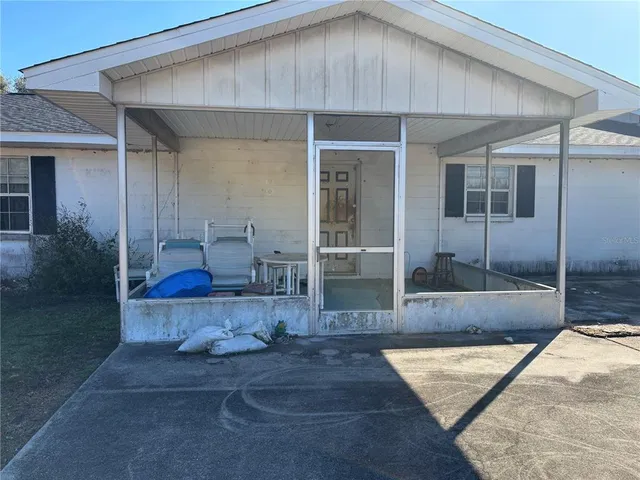 a view of a house with a street