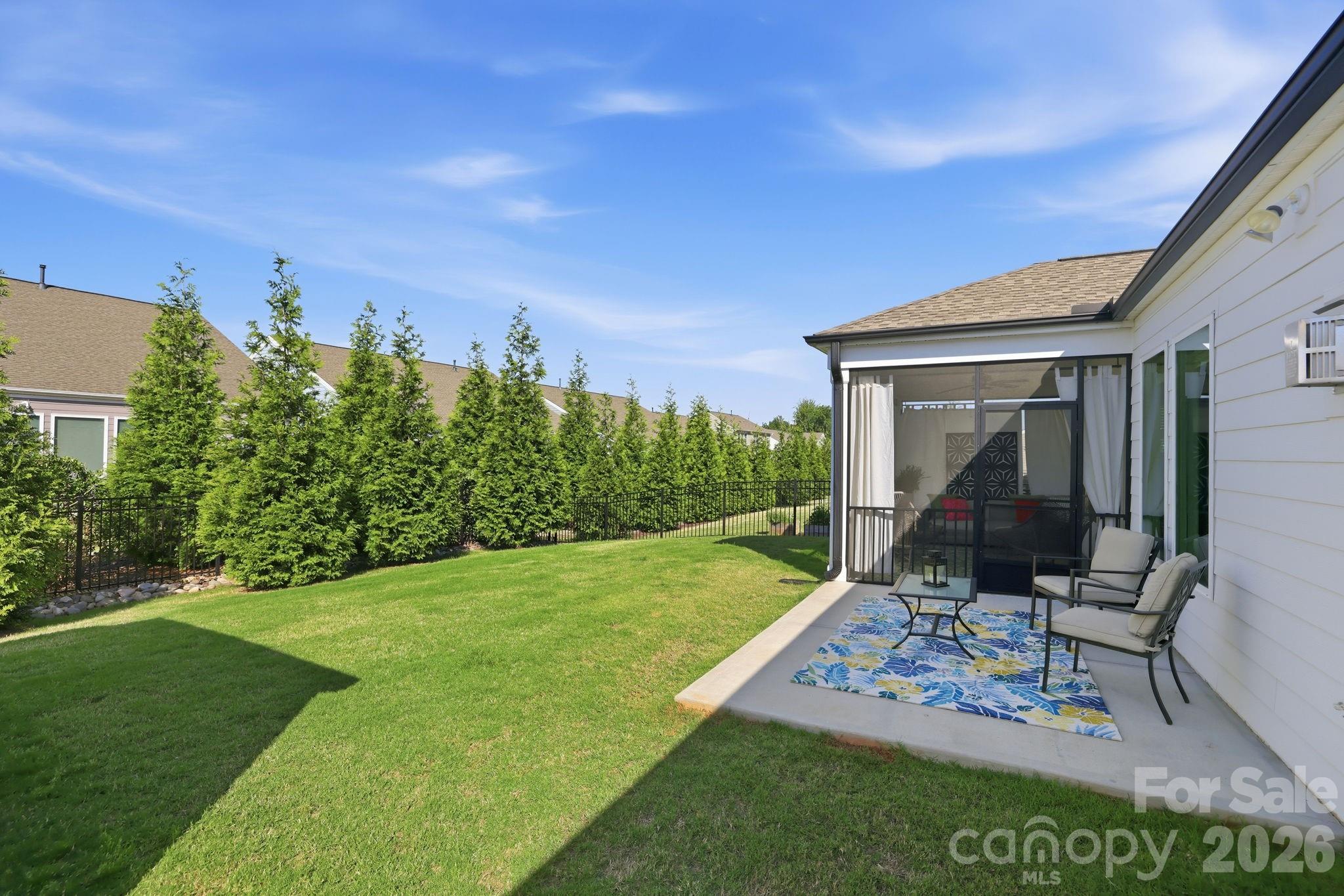 6038 Holland Street Fort Mill, SC 29707 - Photo 35 of 48 a view of a backyard with sitting area