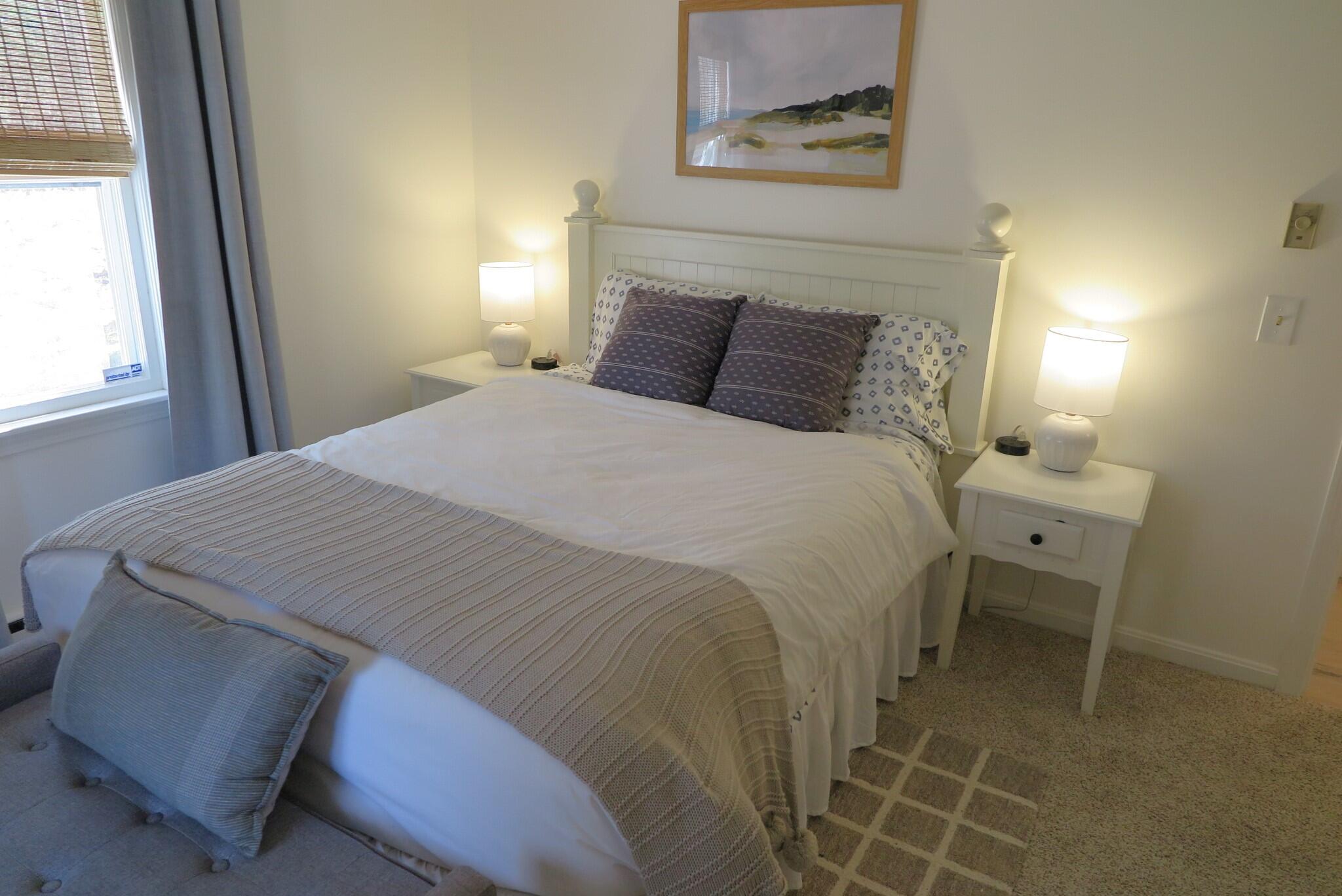 2420 Herring Brook Road Eastham, MA 02642 - Photo 13 of 37 a bedroom with a bed and window