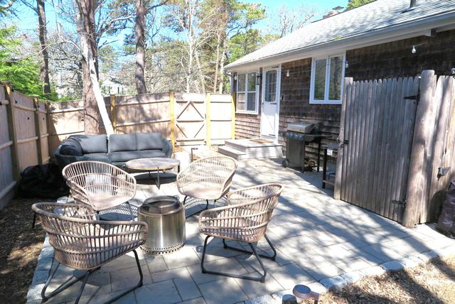 a view of a chairs in patio