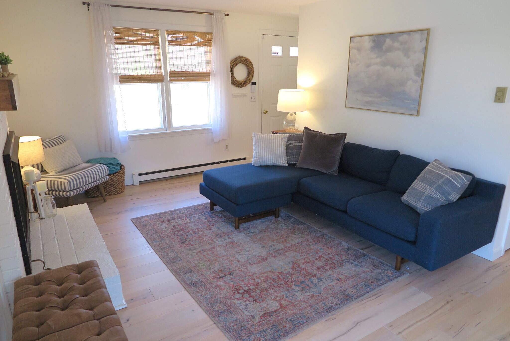 2420 Herring Brook Road Eastham, MA 02642 - Photo 3 of 37 a living room with furniture and a large window