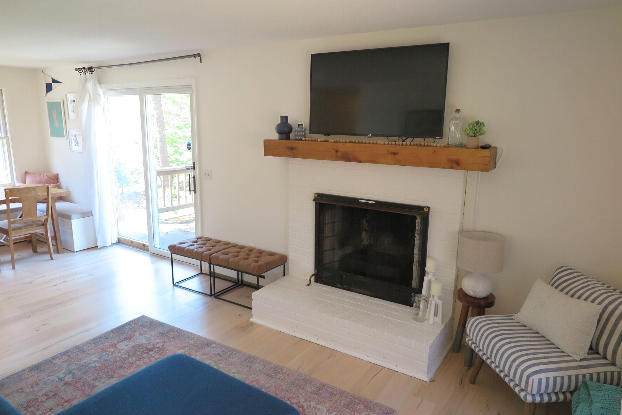 2420 Herring Brook Road Eastham, MA 02642 - Photo 4 of 37 a living room with furniture and a flat screen tv