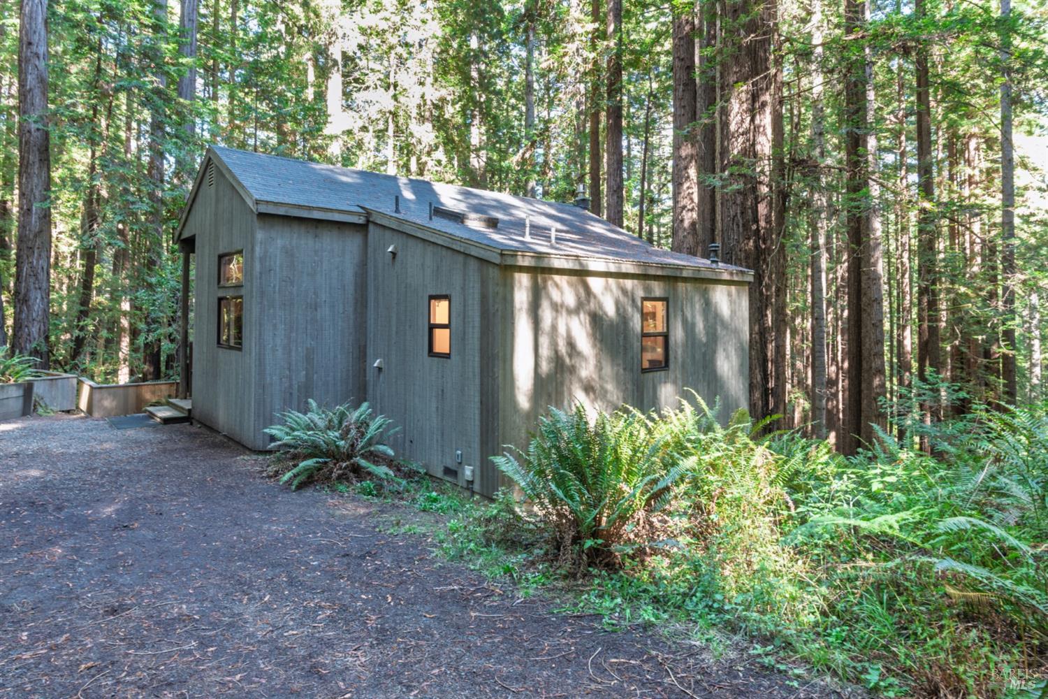 1101 River Beach Road The Sea Ranch, CA 95497 - Photo 2 of 34 a backyard of a house with lots of green space
