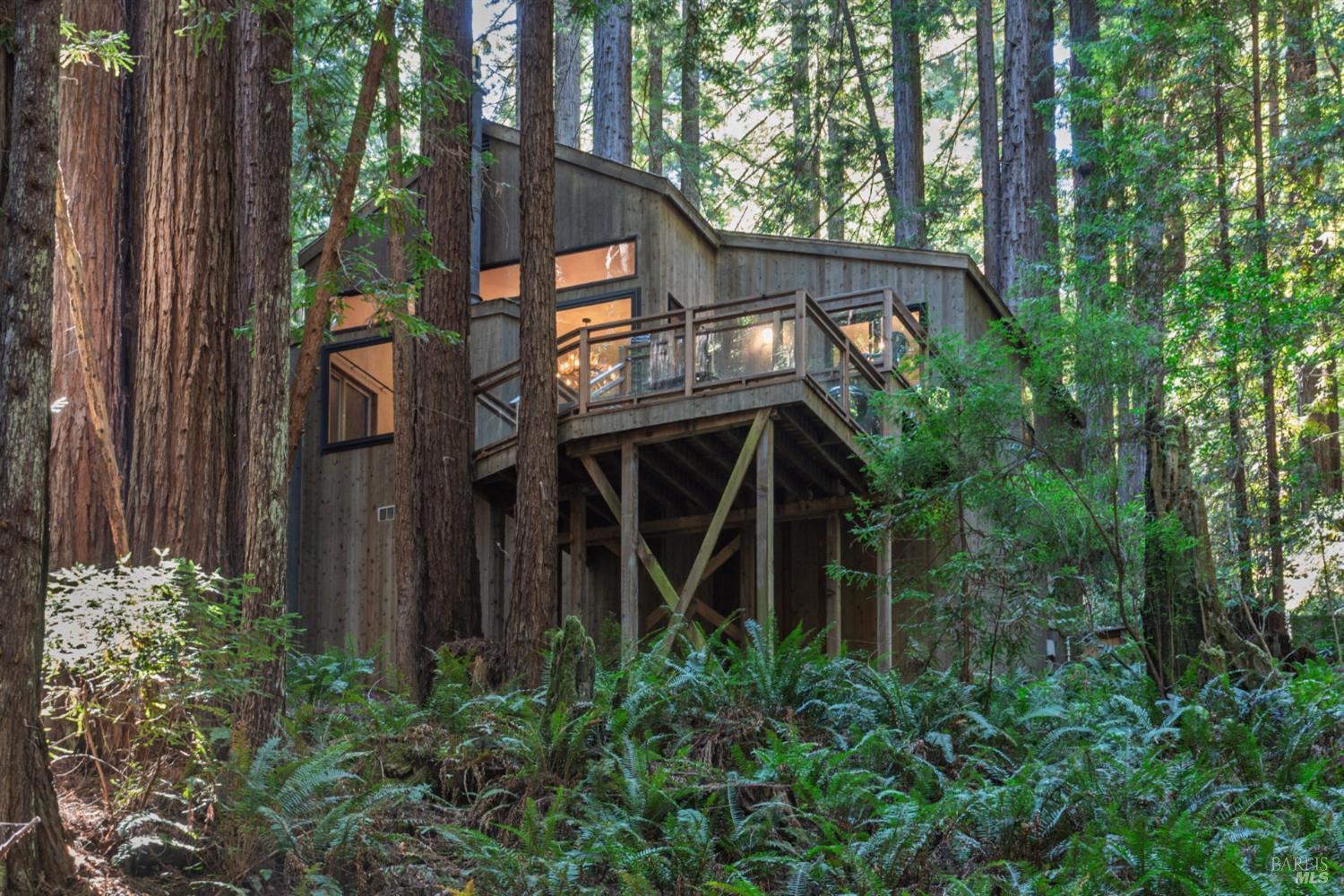 1101 River Beach Road The Sea Ranch, CA 95497 - Photo 3 of 34 a view of a house with a tree in the background