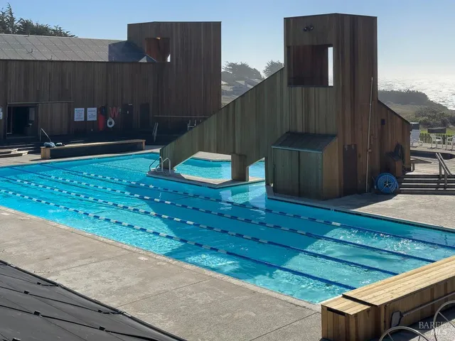 a view of an outdoor space and tennis court