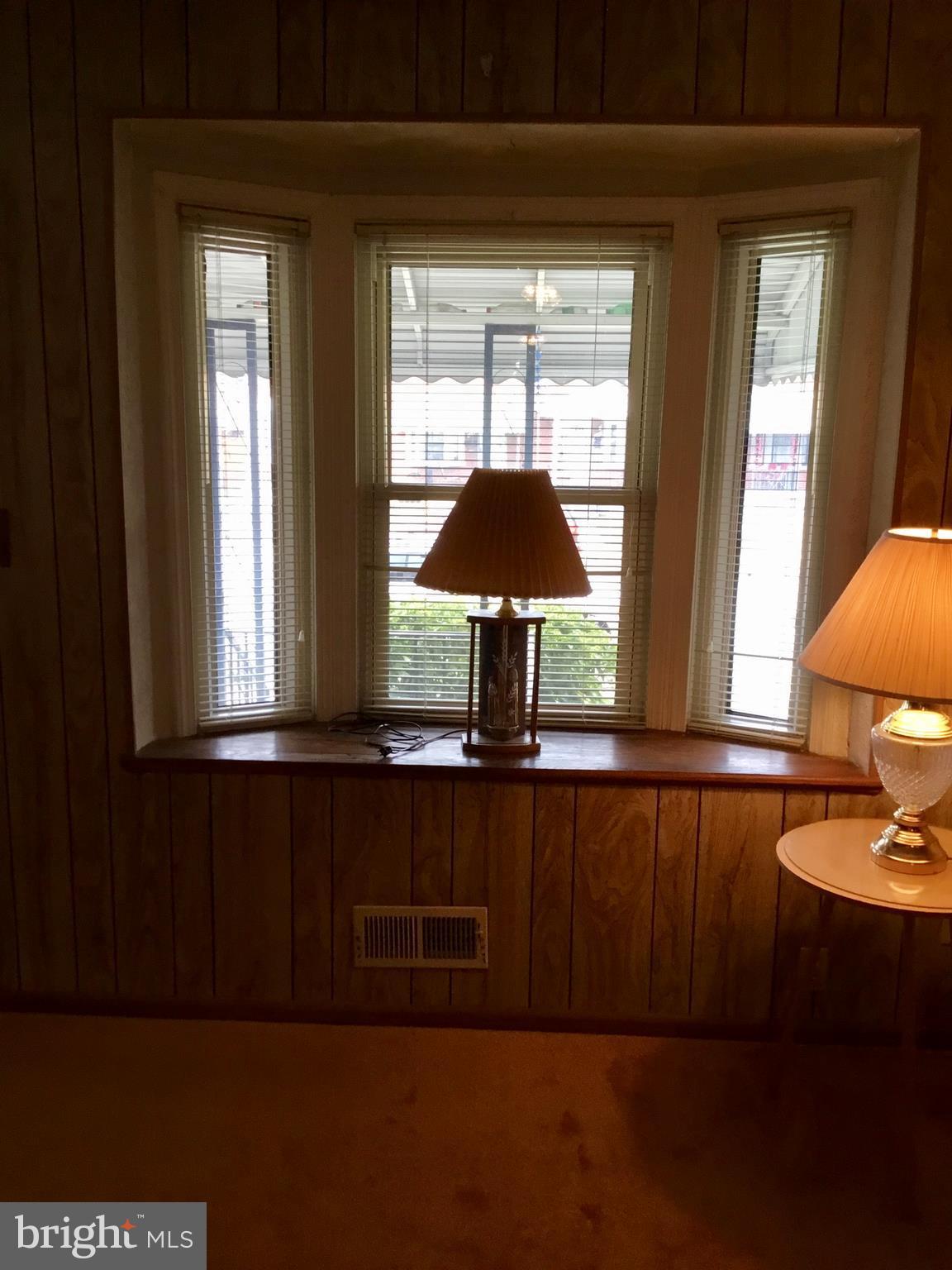 947 Arncliffe Road Baltimore, MD 21221 - Photo 3 of 20 a view of a room that has a window
