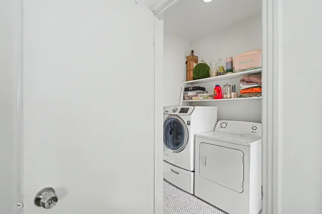 a utility room with dryer and washer