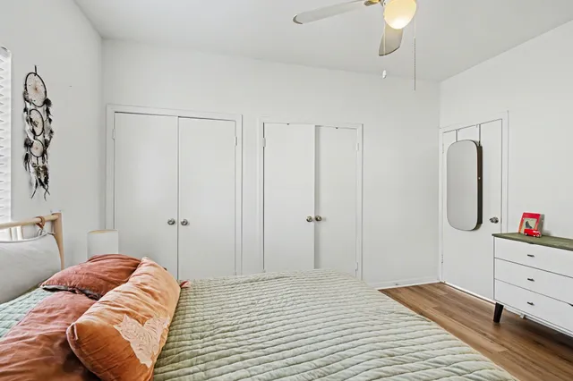 a bedroom with a bed and a cabinets