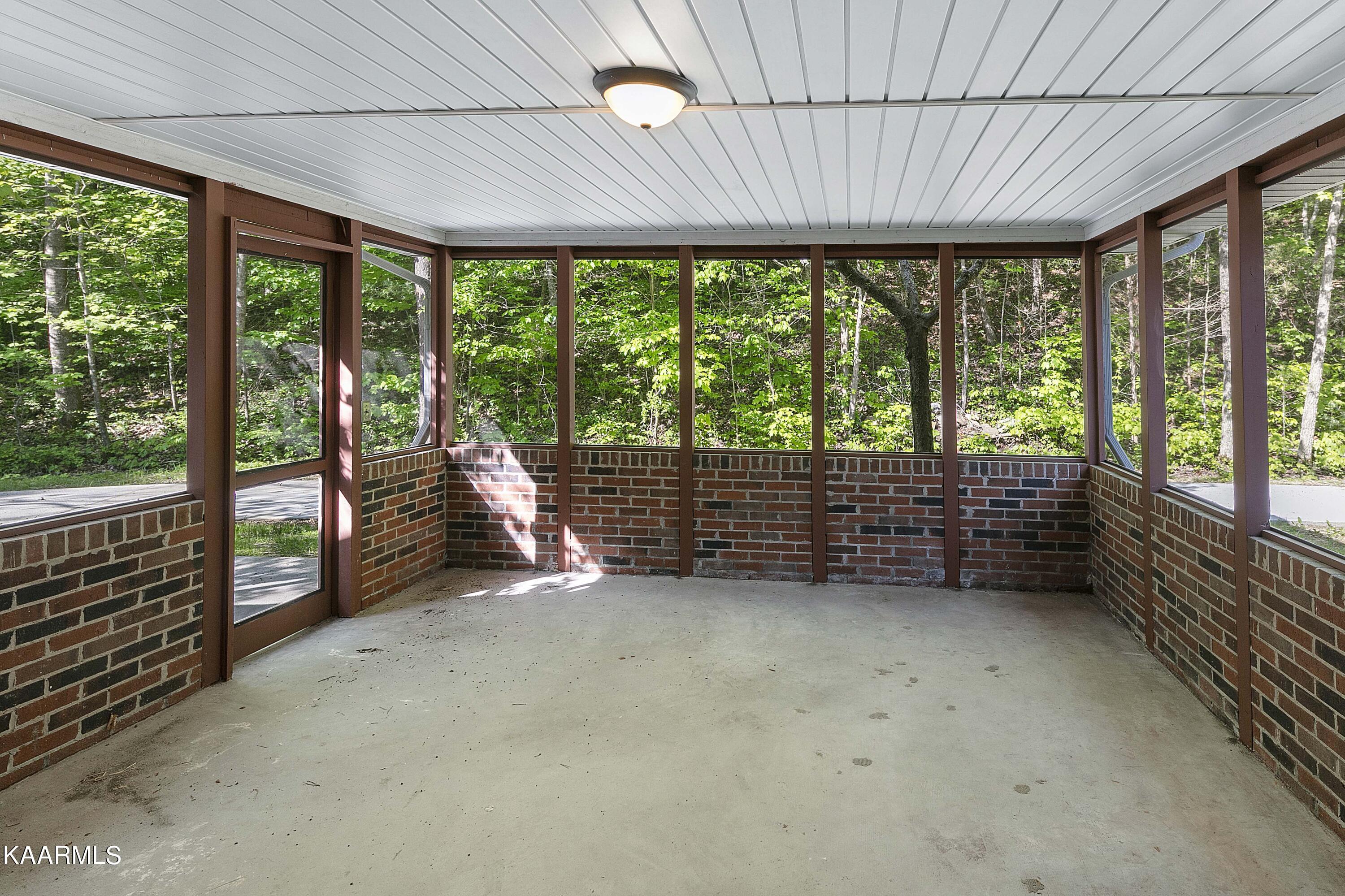 3915 Idumea Road Corryton, TN 37721 - Photo 14 of 39 Screened Porch