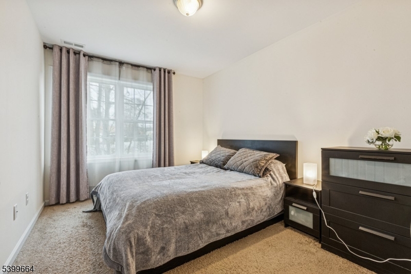 18 Joseph Drive, Unit 18 Newton, NJ 07860 - Photo 18 of 24 a bedroom with a bed and a window