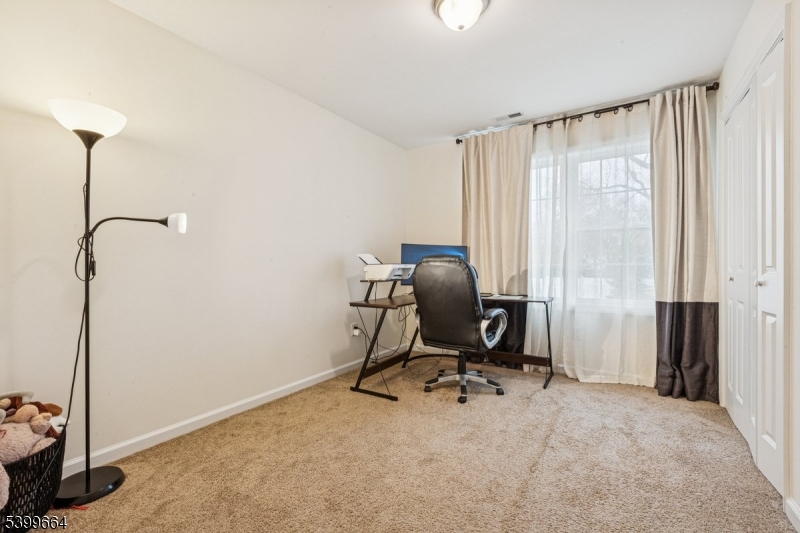 18 Joseph Drive, Unit 18 Newton, NJ 07860 - Photo 19 of 24 a view of a workspace with furniture and a window
