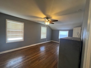 14918 Evers Street Dolton, IL 60419 - Photo 12 of 29 a view of a livingroom with a ceiling fan and window
