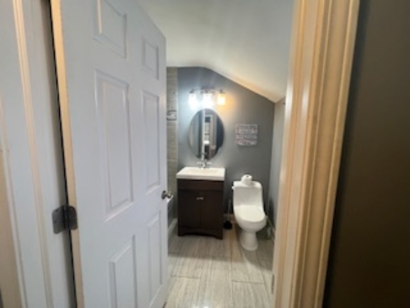 14918 Evers Street Dolton, IL 60419 - Photo 14 of 29 a bathroom with a sink and a toilet