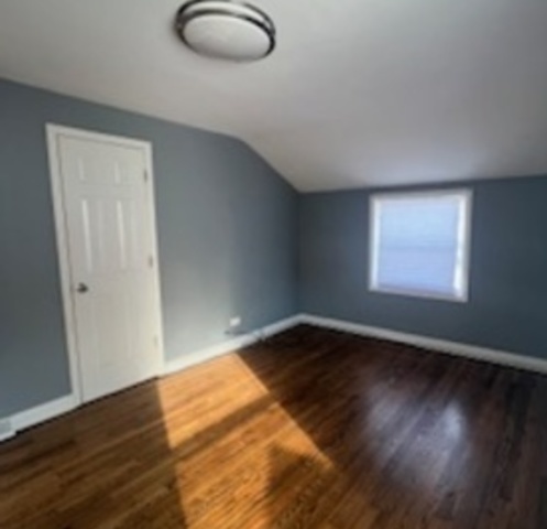 14918 Evers Street Dolton, IL 60419 - Photo 15 of 29 a view of an empty room and wooden floor