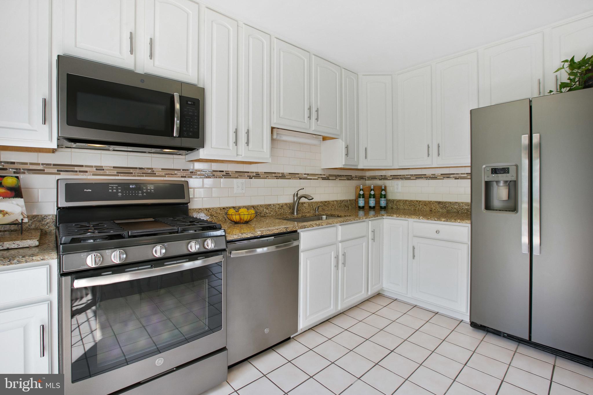 500 Crosby Road Baltimore, MD 21228 - Photo 14 of 41 Practical slate finish, counter depth refrigerator