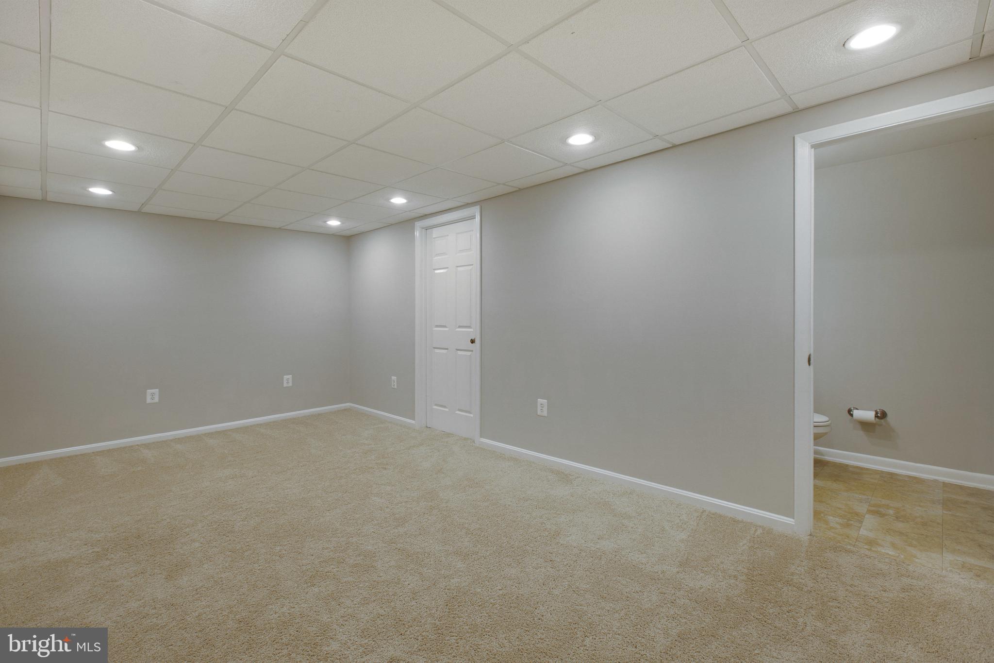 500 Crosby Road Baltimore, MD 21228 - Photo 28 of 41 Lower level Den/Home Office with half bath.