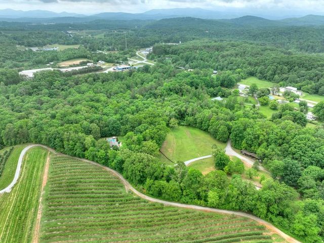 a view of a golf course with a lake