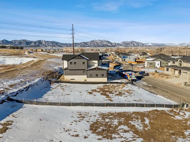 an aerial view of residential building with outdoor space