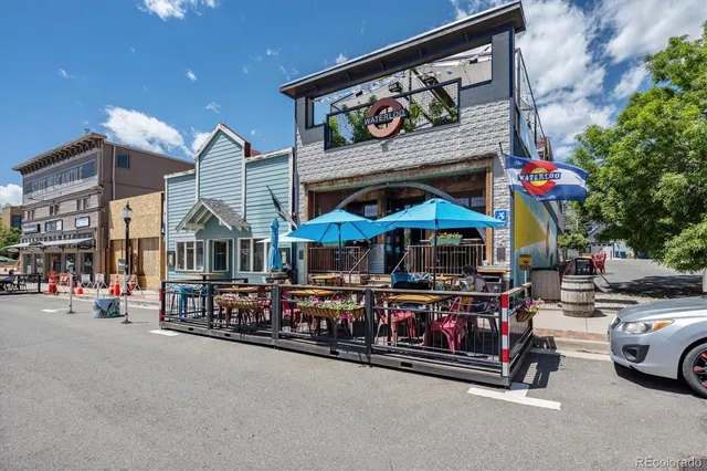 a view of a building and a garage