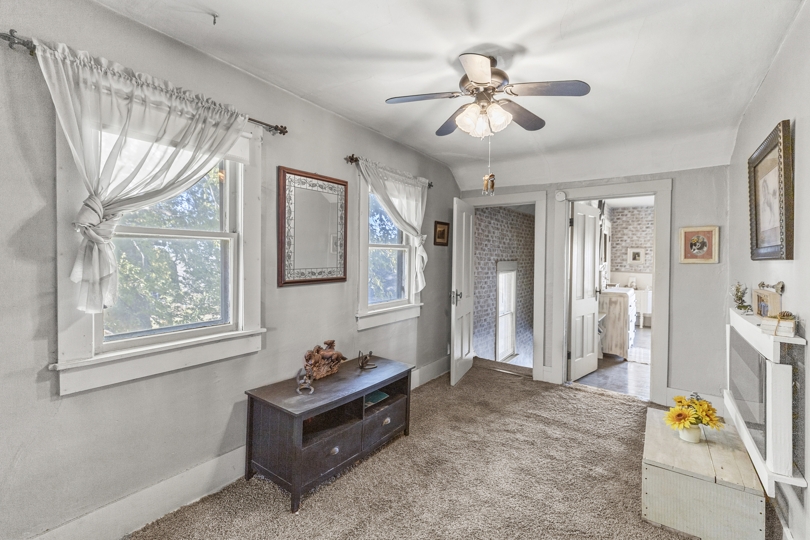 1624 East 1200 North Road Milford, IL 60953 - Photo 24 of 45 a living room with furniture and a window