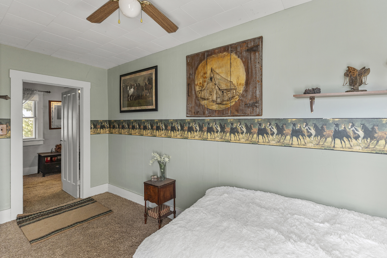 1624 East 1200 North Road Milford, IL 60953 - Photo 29 of 45 a bedroom with a bed and cabinets