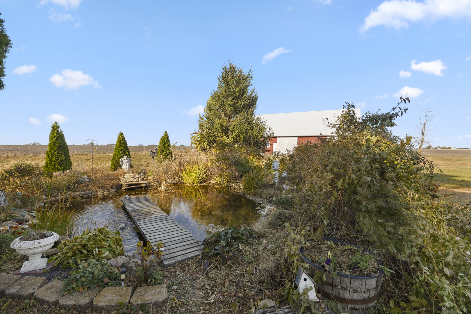 1624 East 1200 North Road Milford, IL 60953 - Photo 9 of 45 a view of a yard with iron fence