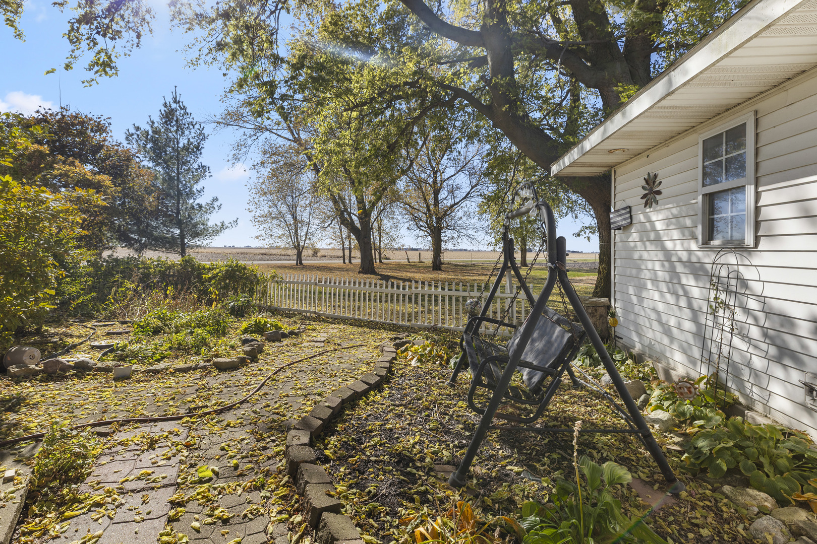 1624 East 1200 North Road Milford, IL 60953 - Photo 10 of 45 a view of a yard with plants and trees