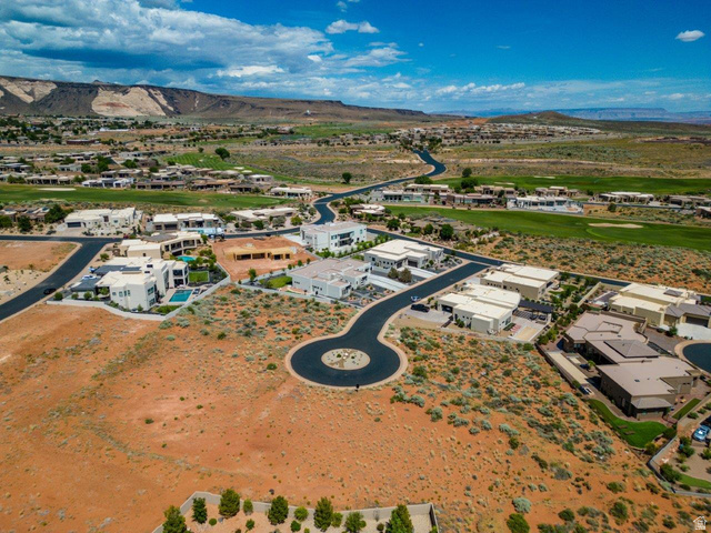Basalt Cir Street, Unit 1027 St. George, UT 84770 - Photo 22 of 29 Aerial perspective of suburban area with a mountainous background