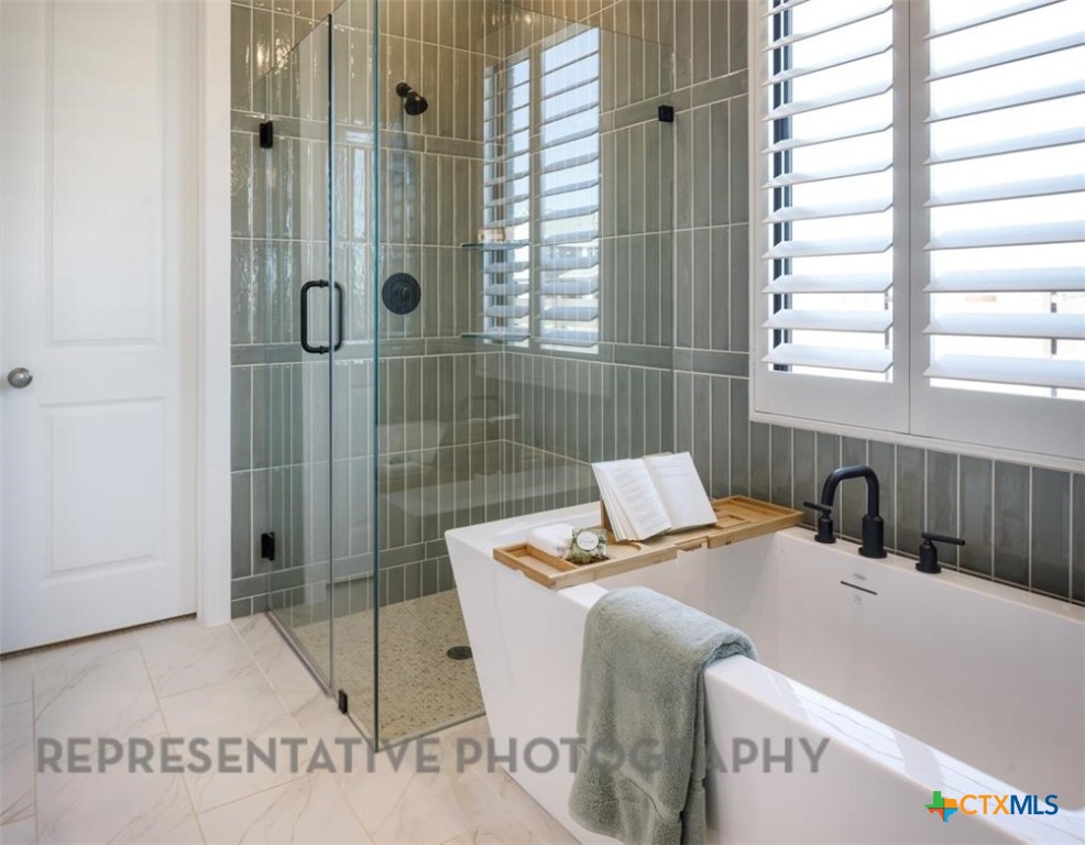 9517 Boathouse Drive Austin, TX 78744 - Photo 12 of 24 Primary Bathroom