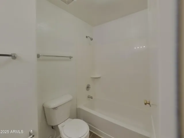 a bathroom with a sink a shower and a mirror