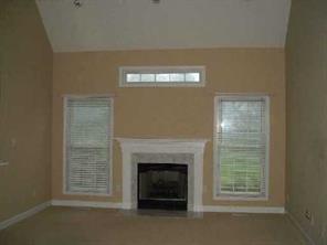 1247 Springlake Road York, SC 29745 - Photo 4 of 8 a living room with furniture and a fireplace