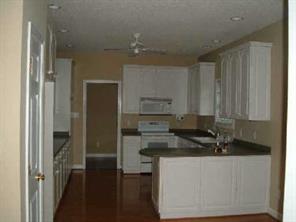 1247 Springlake Road York, SC 29745 - Photo 5 of 8 a kitchen with stainless steel appliances granite countertop a refrigerator a stove and a sink