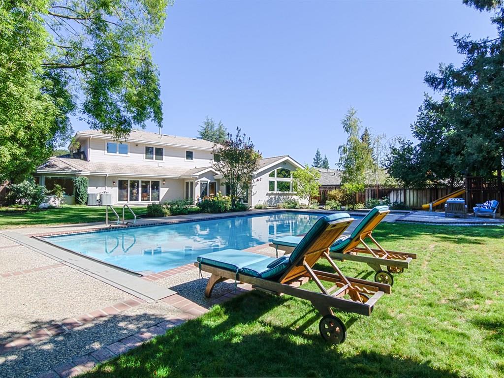 714 Arroyo Road Los Altos, CA 94024 - Photo 1 of 29 an aerial view of a house with swimming pool and porch