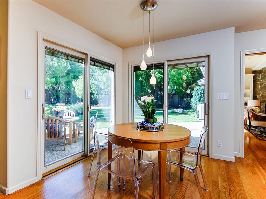 714 Arroyo Road Los Altos, CA 94024 - Photo 13 of 29 a dining room with furniture window and wooden floor