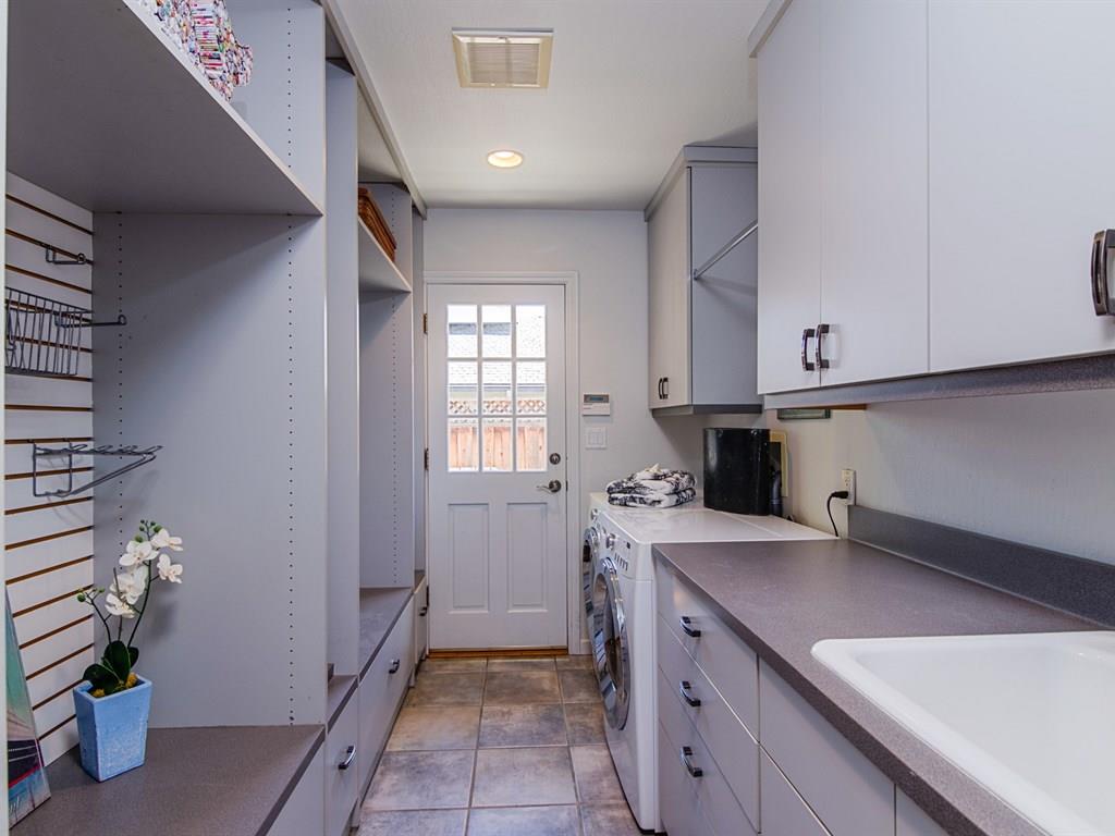714 Arroyo Road Los Altos, CA 94024 - Photo 16 of 29 a kitchen with a sink and cabinets