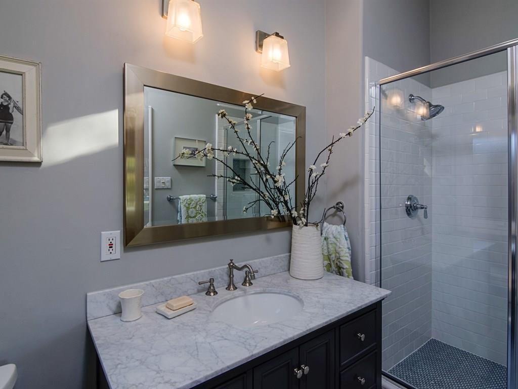 714 Arroyo Road Los Altos, CA 94024 - Photo 21 of 29 a bathroom with a granite countertop sink and a mirror