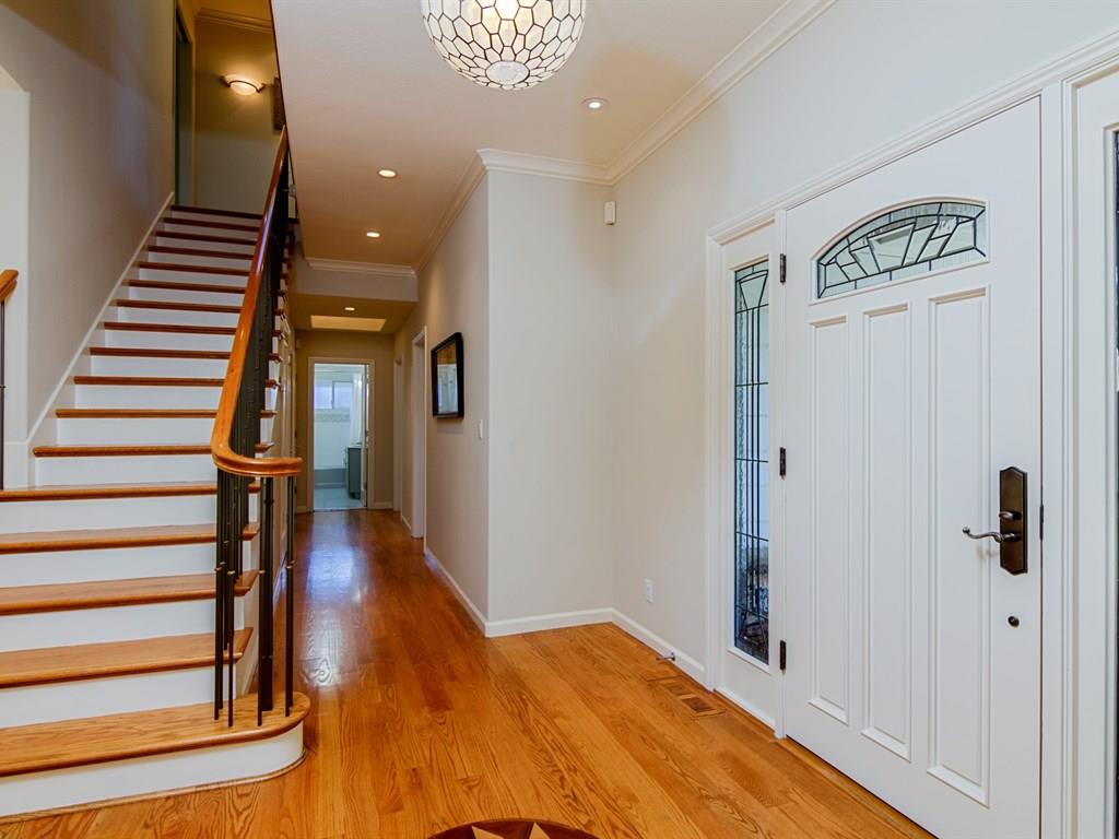 714 Arroyo Road Los Altos, CA 94024 - Photo 3 of 29 a view of a hallway with wooden floor and staircase