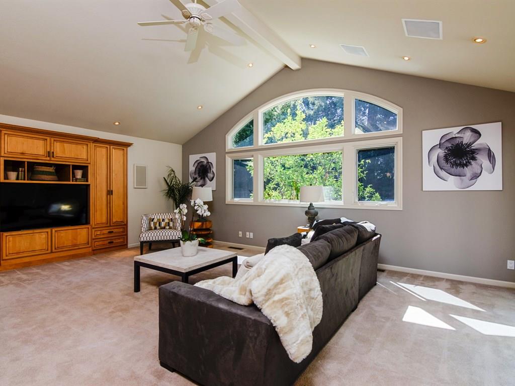 714 Arroyo Road Los Altos, CA 94024 - Photo 7 of 29 a living room with furniture and a flat screen tv