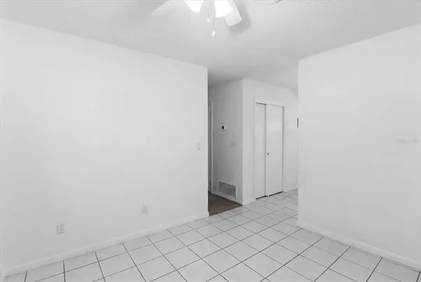 a living room with furniture and window