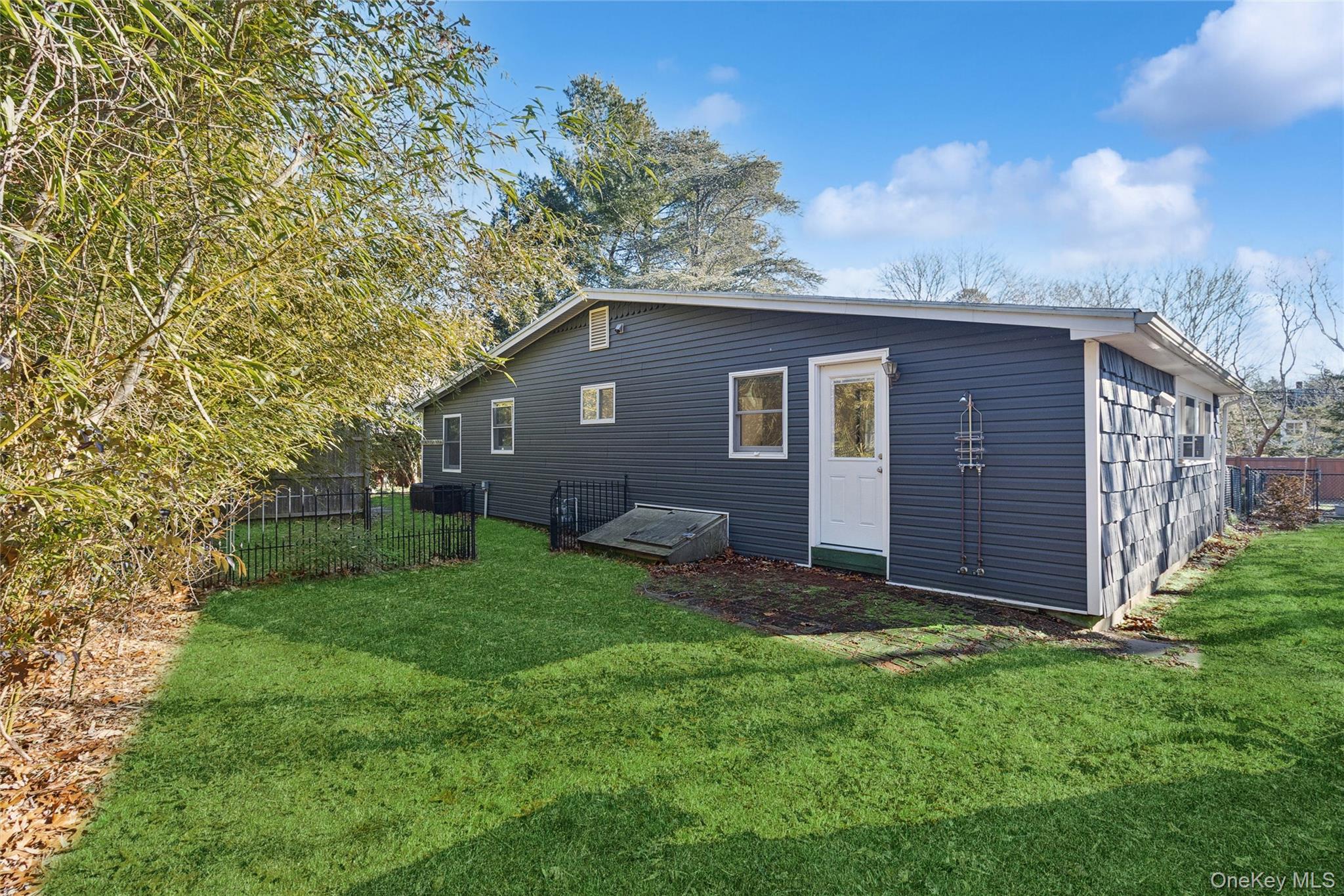 165 Springville Road, Unit A Hampton Bays, NY 11946 - Photo 20 of 22 Back of property