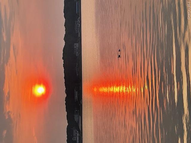 165 Springville Road, Unit A Hampton Bays, NY 11946 - Photo 22 of 23 a view of lake and sunset